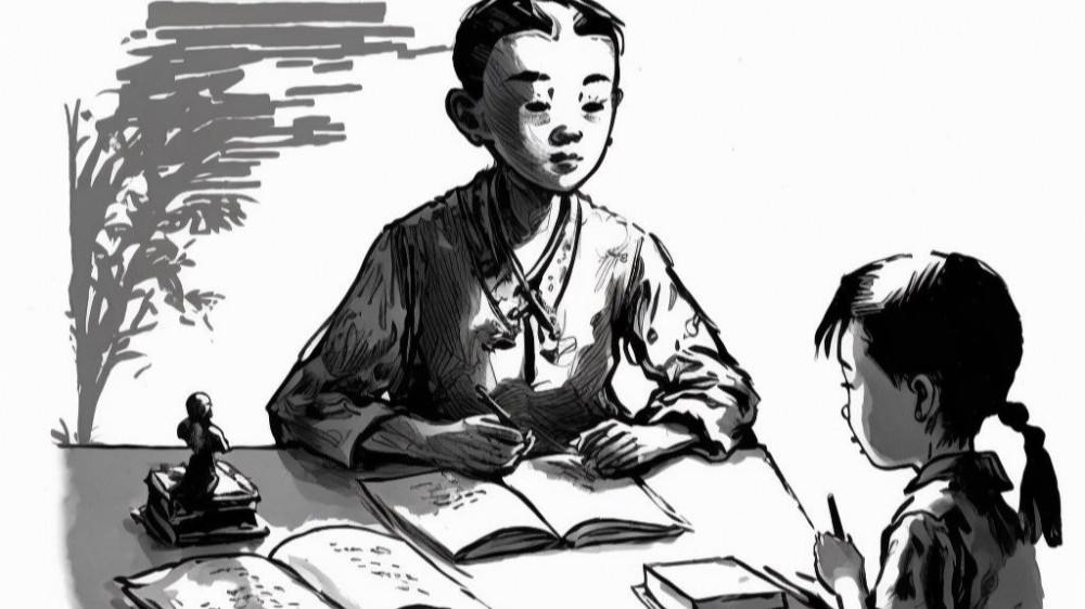 书桌前的莫小言和林